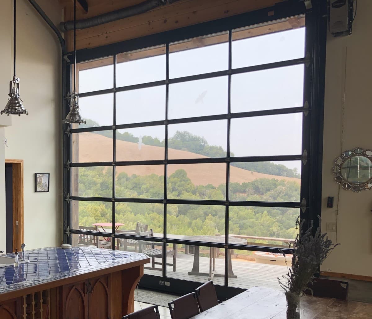 bp Overhead Glass Garage Doors Eliminate Floor Tracks and Pinch Points in Luxury Walls